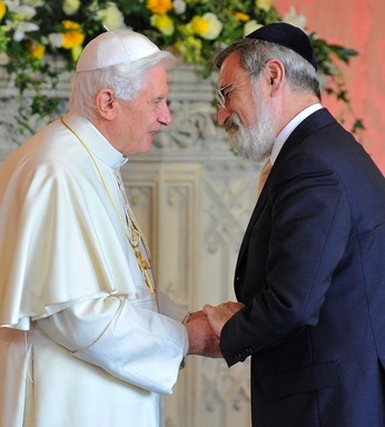 Pope Benedict XVI greets Lord Rabbi Jonathan Sacks, then chief rabbi of Britain, at a 2010 meeting of religious leaders in London.