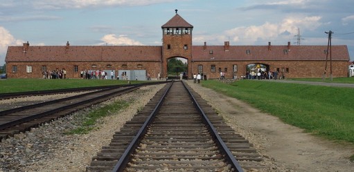 Main gate at Auschwitz II (Birkenau), and the railroad tracks leading up to it.