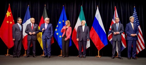 Secretary of State John Kerry (at right) poses with his P5+1 and Iranian negotiating partners in Vienna on July 14, shortly after the formal announcement of a nuclear deal with Iran.