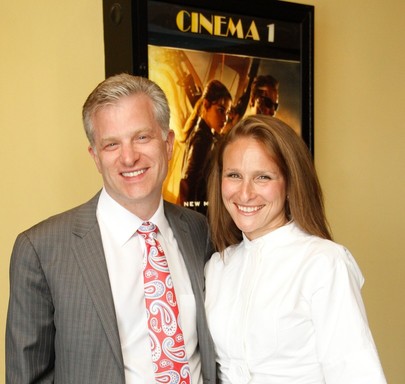 Pictured at their grand reopening: Owner Seth Pilevsky of Philips International and his wife Dena.