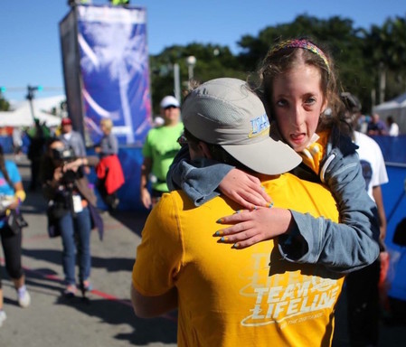 Peri Finkelstein and her day, Paul, after last year's Chai Lifeline marathon.