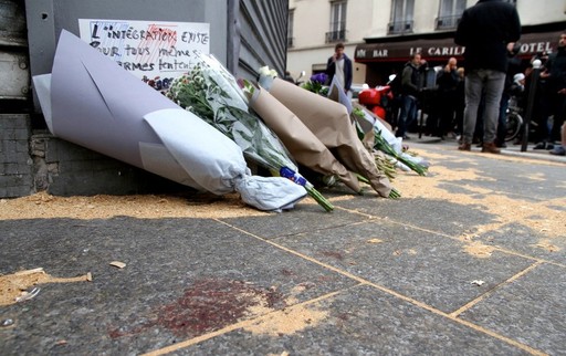 Outside the Le Petit Cambodge restaurant&mdash;site of one of six coordinated Islamist terror attacks in Paris&mdash;a makeshift memorial of flowers on the day after the attacks.