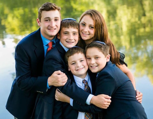 Ezra Schwartz, at far left, with his four younger siblings in his hometown of Sharon, Massachusetts.