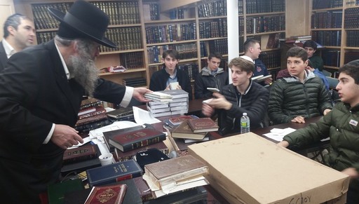 HAFTR&rsquo;s Rabbi Moshe Hubner looks on as HaGaon R&rsquo;Shorr speaks with his students in Flatbush.