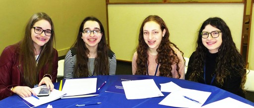 HAFTR High School sophomores Amanda Schoor, Sarah Kopyto, Miriam Kopyto and Chloe Gottlieb helped host the 25th annual Yeshiva Model Congress at Young Israel of Woodmere.