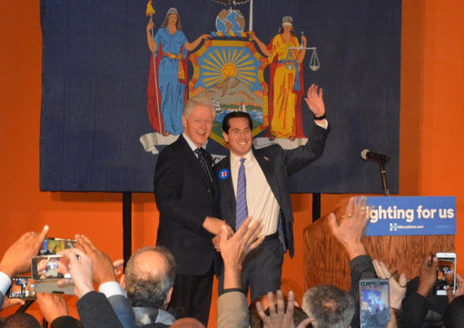 Former President Bill Clinton endorsed Assemblyman Todd Kaminsky in his state Senate race against Republican Chris McGrath, at a rally on Tuesday on Long Island rally to support Hillary Clinton.
