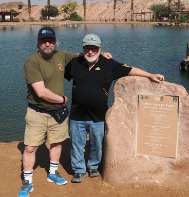 David and Robert Chudnow at the man-made lake created 30 years ago by their father, Avrum.