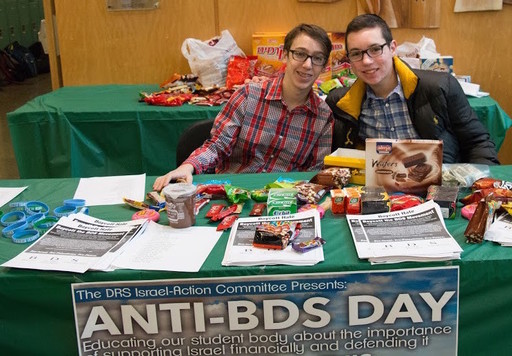 Freshman Harry Chwat and sophomore Sruli Fruchter sell Israeli-made goods at DRS&rsquo;s Anti-BDS Day sale, with the proceeds going to combat the BDS movement.