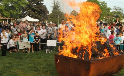Even though it was warm out pleantly of people gathered to watch the impressive fire roar