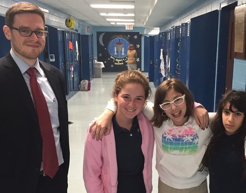 HAFTR's new middle school principal, Joshua Gold, with (from left) Julia Fox, Sophia Green and Shira Dinowitz.