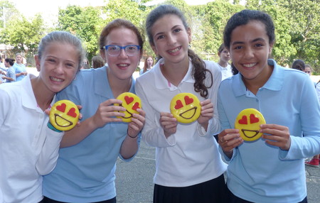At the Shulamith School for Girls in Cedarhurst, the smiles are on the girls&rsquo; faces as well as their cookies. From left: Shaked Harari, Shayna Wasser, Rachel Schwartz and Lily Paritzky.