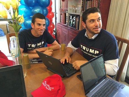Queens native Chaim Rosenfield, 19 (left), worked at the opening of Donald Trump&rsquo;s Karnei Shomron office on Monday.
