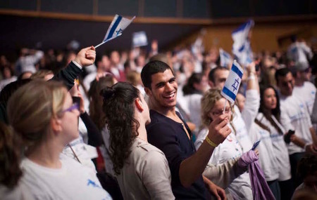 Young Jewish adults from all over the world participating in the Taglit Birthright program celebrate 10 years of the Birthright program at an event held at the International Conference Center in Jerusalem on Jan. 7, 2013.