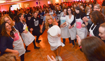 Attendees dance and sing as their dough rose at last year&rsquo;s Great Challah Bake. To volunteer for this year&rsquo;s event, email TheGreatChallahBakeLIStyle@gmail.com