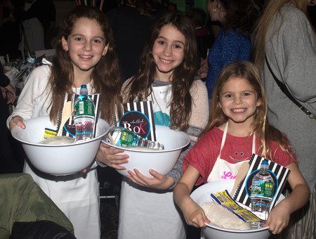 Kayla, from Westchester, flanked by Roslyn sisters Julia and Lucy, clearly enjoyed the fun of making challah together at the Great Challah Bank Long Island Style, at the Sands Atlantic Beach.