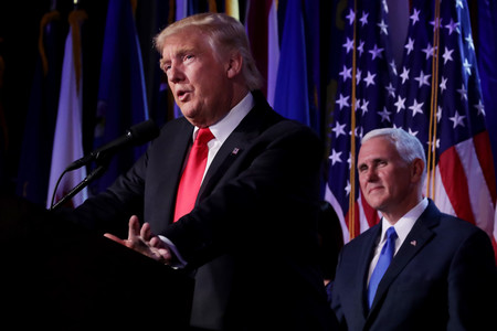 President-elect Donald Trump delivering his acceptance speech as Vice President-elect Mike Pence looks on at the New York Hilton Midtown in Manhattan on Nov. 9.