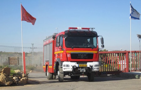 A fire truck contributed by the Young Israel of Woodmere is deployed in Israel during last week's arson fires. Now, the YIW is raising money to buy two more trucks.