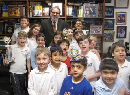 Rabbi Mordechai Besser with MDS Chess Tournament winners in 2016.