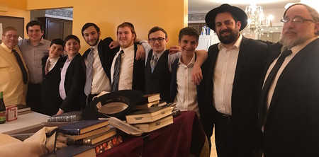 From left: Easton, Pennsylvania, community member, Yehuda Goldblatt; Avi Balsam; Gavriel Toplan, Pinny Verstandig, son of R&rsquo; Yagod; Ariel Blumstein; Moshe Orlofsky; R&rsquo; Yaacov Weisenberg; and R&rsquo; Isaac Yagod.