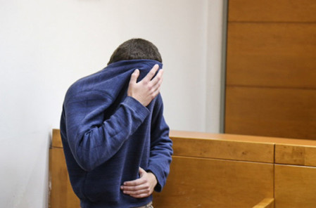 A man brought for a court hearing at the Rishon Lezion Magistrate's Court, under suspicion of Issuing fake bomb threats against Jewish institutions around the world, on Thursday.