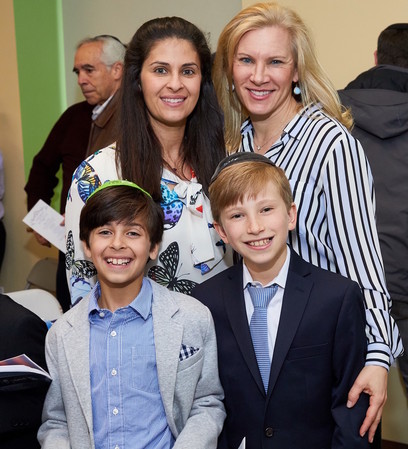 From left: Eitan Orlofsky and his mom Arielle, and Dovi Kimmel and his mom Neera.