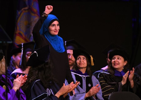 Linda Sarsour speaking at the CUNY Graduate School of Public Health&rsquo;s inaugural commencement ceremony at the Apollo Theater on June 1.