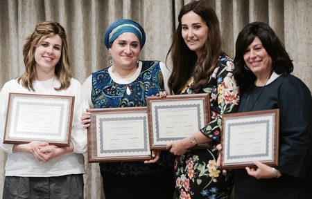Some of the Chesed Leadership Program alums (from left): Yitty Fisch of Kapayim, Chaya Travis of Sephardic Bikur Cholim, Allison Josephs of Jew in the City, and Leba Schwebel of the Amatz Initiative.