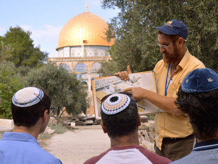 Temple Mount activist Yehuda Glick, in 2013, displays a diagram of the Temple that stood where the Dome of the Rock stands today in Jerusalem.