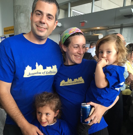 The Goldfeders of Kew Gardens Hills went home to Israel on Monday. Chanoch and Chani and their children, Reut (left) and Elana, were among 233 slim on Nefesh B'Nefesh's second summer