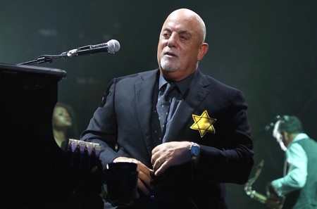 Billy Joel wears a jacket with the Star of David during the encore of his 43rd sold out show at Madison Square Garden on Aug. 21, 2017.