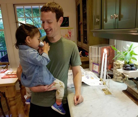 Mark Zuckerberg holding his daughter Max while she drank from the cup, which he said belonged to her great-great-grandfather, also named Max. This photo was posted before Rosh Hashana.