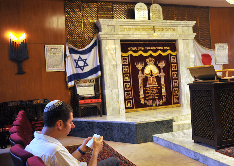 A jewish man prays at the Kobe synagogue in Japan on June 26, 2009.