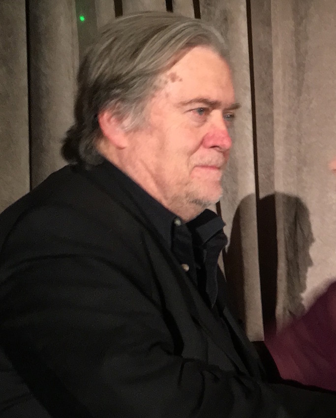 former White House Chief Strategist and current Executive Chairman of Breitbart News Steve Bannon listens as he&rsquo;s introduced by East End Rep. Lee Zeldin.