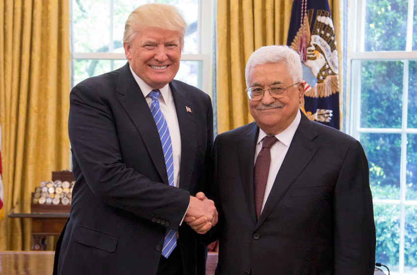 President Donald Trump and President of the Palestinian National Authority Mahmoud Abbas shakes hands as they in the Oval Office on Wednesday, May 3, 2017.