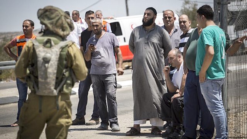 The family of a Palestinian man who stabbed a soldier, at Bell Checkpoint in 2015.