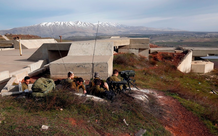 Israeli soldiers taking positions near the border with Syria on Feb. 10.