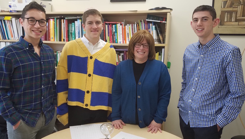 Robin Schick, who oversaw each student&rsquo;s application, is pictured with Jake Weinstock, Jacob Appel and Sruli Fruchter.