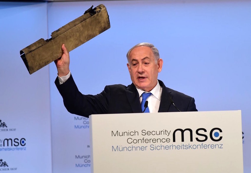 At the Munich Security Conference, Prime Minister Netanyahu displays a fragment of an Iranian drone destroyed over Israeli airspace last week.