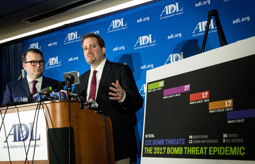 Evan Bernstein, left, and Oren Segal discuss the arrest of a St. Louis man charged in connection with bomb threats against JCCs, at the Anti-Defamation League national headquarters in New York, March 3, 2017.