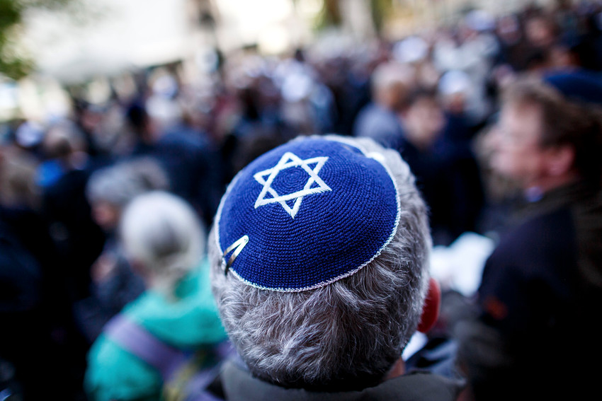 A man wearing a kippah at an April 25 gathering in Berlin to protest anti-Semitism.