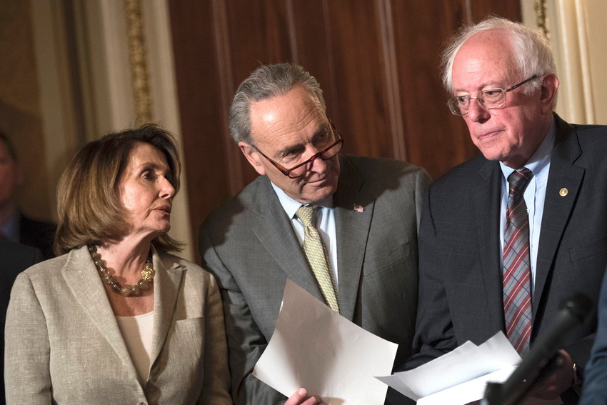 House Minority Leader Nancy Pelosi, Senate Minority Leader Chuck Schumer, and Sen. Bernie Sanders confer during a press conference on Capitol Hill, May 25, 2017 in Washington, DC.