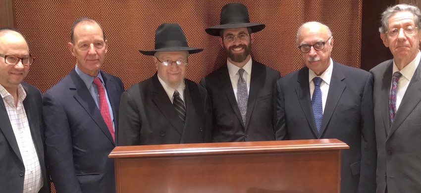 At the Five Towns&rsquo; Kristallnacht remembrance, at Kehillas Bais Yehudah in Cedarhurst, from left: David Klein, Theodore Roosevelt IV, rabbis Yaakov Feitman and Ephraim Polakoff, cantor Robert Vegh, and event co-chair Alan Jay Gerber.