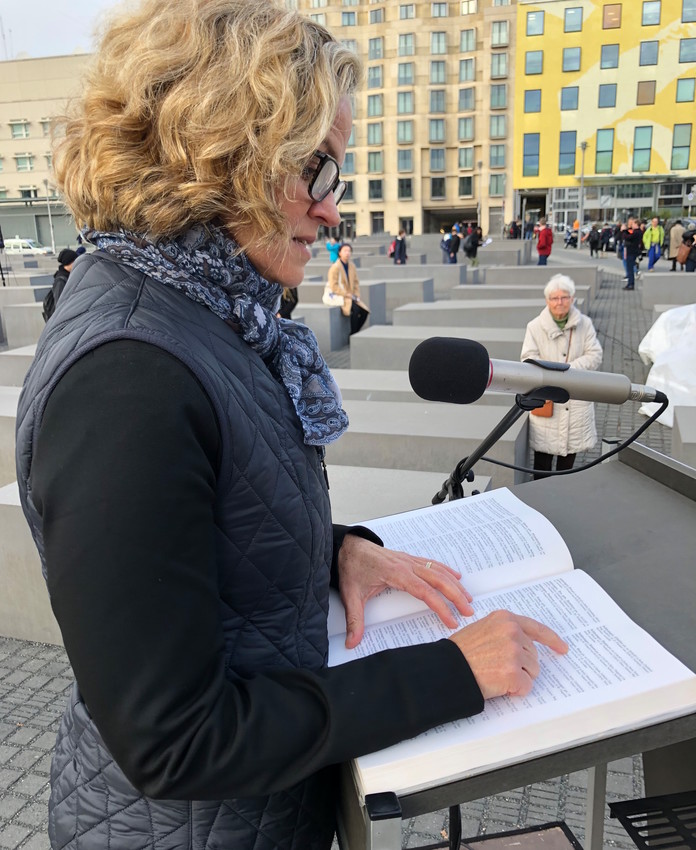During a service at a Shoah memorial in the German capital, Nassau County Executive Laura Curran reads aloud names of Berliners who perished during the Holocaust.
