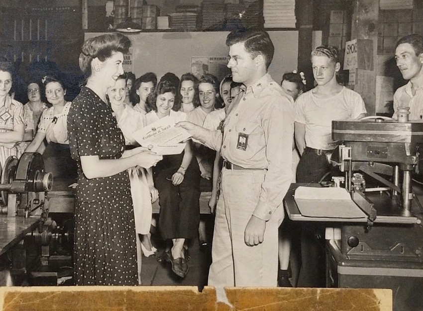 Jeanette Kern, left, receiving one of the two commendations she received for her work during World War II as a clerk in the Army Signal Corps, July 27, 1944.