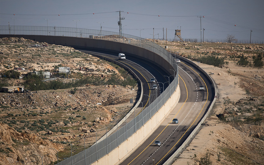 Route 4370, with a wall dividing Israeli and Palestinian traffic, on Jan. 10.
