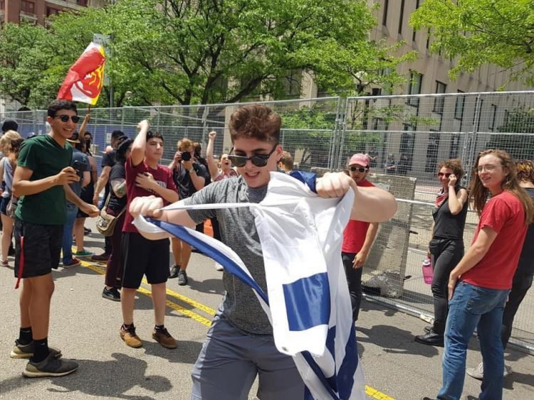 While most of those who turned out to protest a small KKK rally in Dayton, Ohio, were there to speak out against hate, a few turned their opposition to the KKK into a moment to attack the Jewish state.