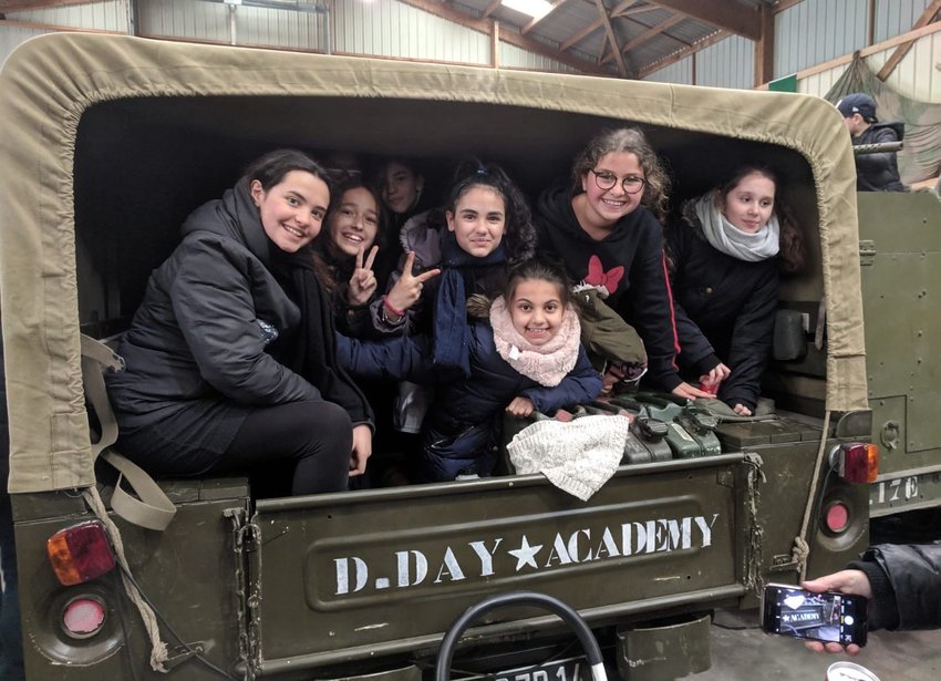 In Normandy, France, site of the decisive Allied landing on D-Day that turned the tide of World War II, students take part in an on-scene history lesson.