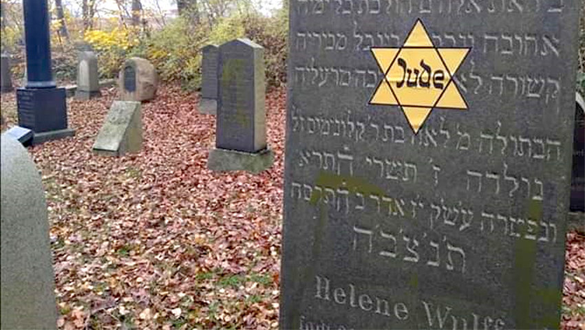 A Yellow star sticker on a Jewish grave in Denmark on Nov. 10.