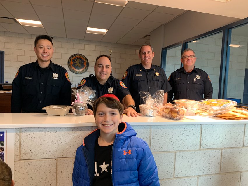 Matthew Schein took baked goods to two fire departments and a police station.