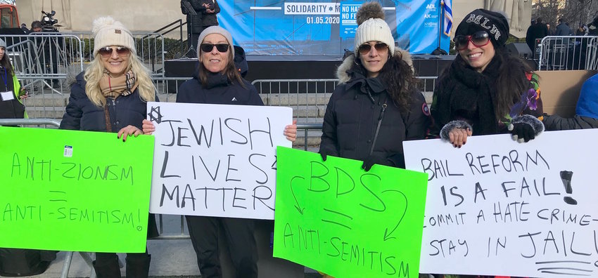 Among Long Islanders who joined last Sunday&rsquo;s rally in Brooklyn Heights were (from left) Rita Goldberg of Woodmere, Sandi Gershowitz of Oceanside, and Rachel Gottfried and Michal Weinstein of Woodmere. They arrived early and positioned themselves directly in front of the rally stage in Cadman Plaza Park, where they held politically-explicit homemade signs proclaiming &ldquo;Jewish Lives Matter,&rdquo; &ldquo;Bail Reform is a Fail,&rdquo; &ldquo;BDS = Anti-Semitism&rdquo; and &ldquo;Anti-Zionism = Anti-Semitism.&rdquo;
